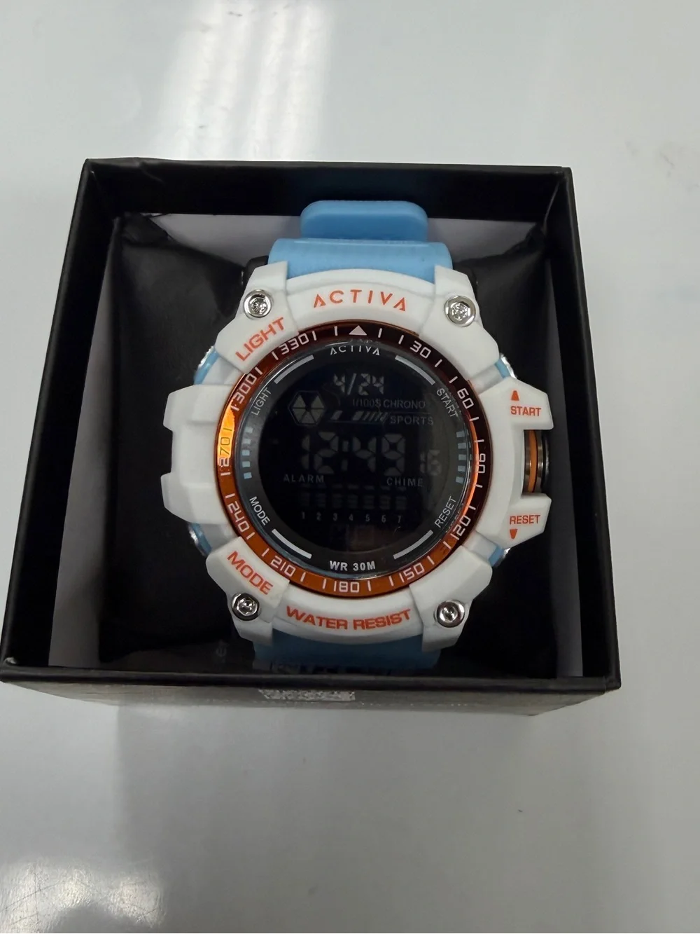 Ativa Light Blue and White Digital Sports Watch with Orange Accents